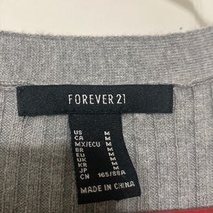 Grey and black buttoned up cardigan